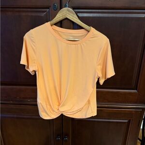 Bright melon twist front yoga top, size Large.